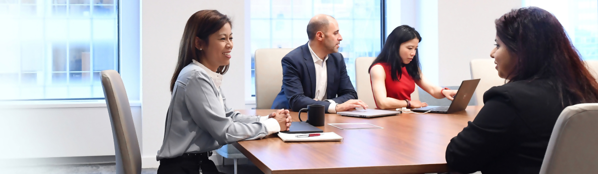 A team collaborating on sustainability efforts at Interactive Brokers